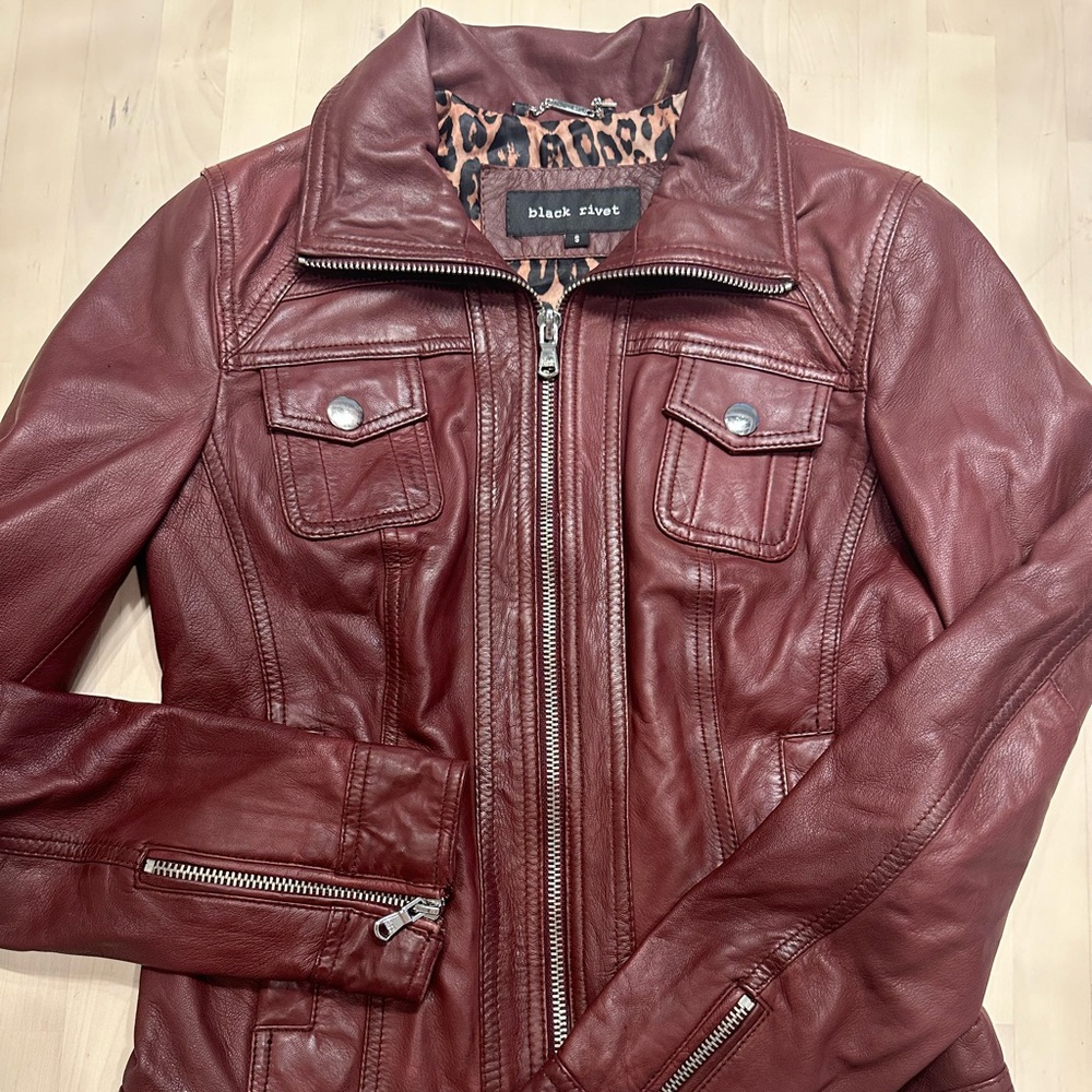 Black Rivet leather jacket.